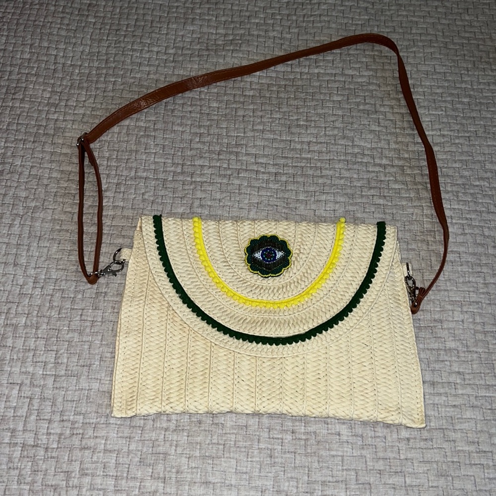 Paper bag with embellishments. Faux leather strap. Like new!